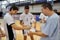 Steven Gardoni (right) has Special Olympics Serbia volleyball teammates sign his volleyball as a keepsake. Gardoni, a Special Olympics coach from the United States, was one of 10 coaches taking part in a coaching fellowship funded by the SportsUnited Division of the U.S. Department of State. The 10 fellows from the United States, Serbia, and Montenegro learned side by side with more than 20 Special Olympics coaches from 11 countries.<br /><span>Photo by Jenna Briggs/SOI</span>