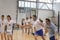 Vladimir ‘Vanya’ Grbic (Serbian Volleyball Olympic gold medalist) warms up with Steven Gardoni  and local Special Olympics Serbia Unified volleyball athletes and partners.<br /><span>Photo by Jenna Briggs/SOI</span>