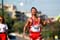 A Thai athlete finds joy in completion.<br /><span>Photo Credit: Diego Azubel</span>