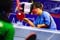 A Japanese athlete focuses on her shot.<br /><span>Photo Credit: Diego Azubel</span>